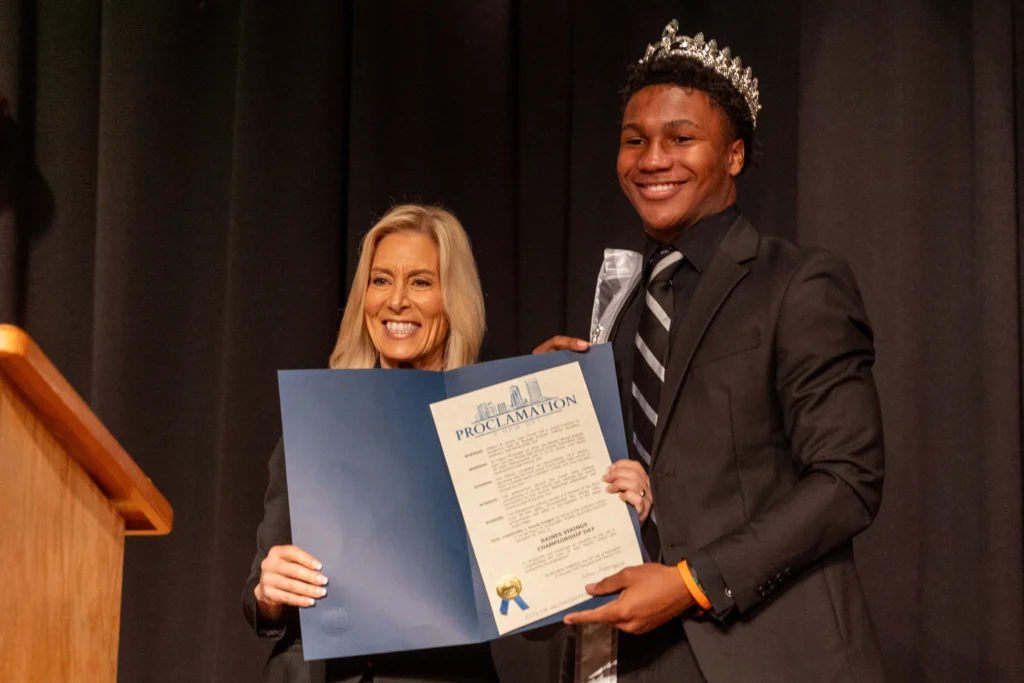 Jacksonville Mayor Donna Deegan and Raines quarterback Timothy Cole
