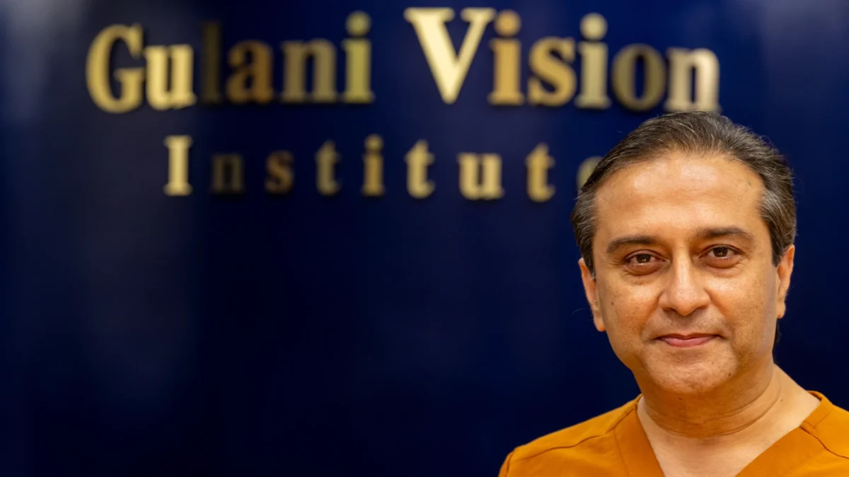 Dr. Arun Gulani stands inside his office, where he promotes medical tourism.