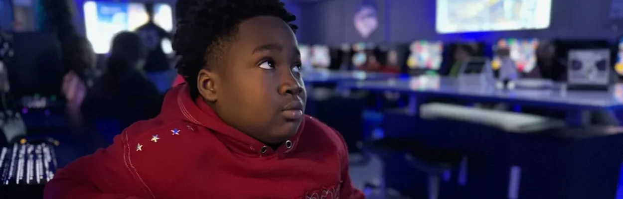 A student from Fort Caroline Elementary sits in the district's new 3D printing lab.