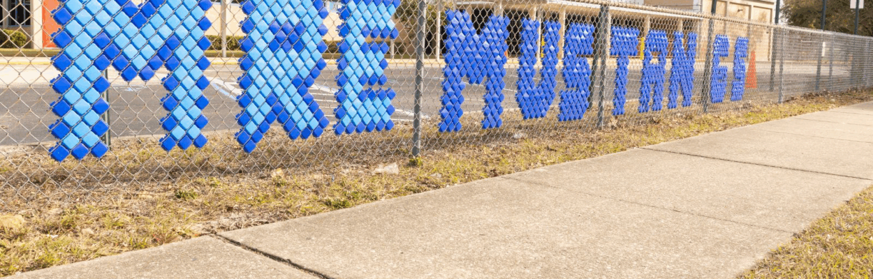 The fence in front of Merrill Road Elementary, which is on Mater Academy's list for Schools of Hope.