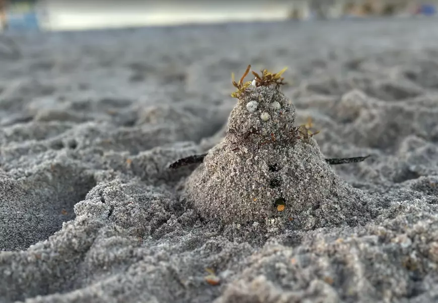 A sand snowman
