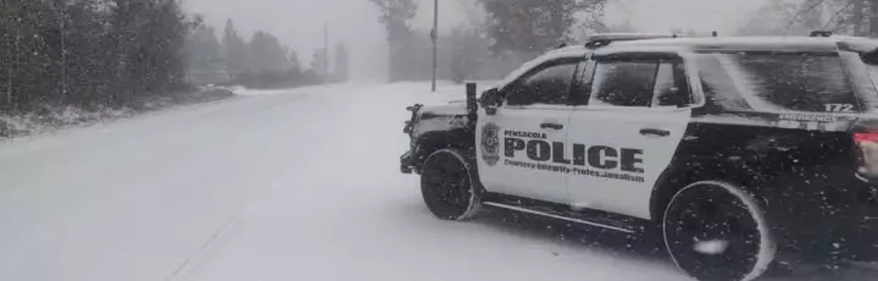 A Pensacola police car sits in the snow last winter.