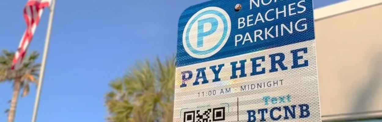 A Neptune Beach parking rate sign