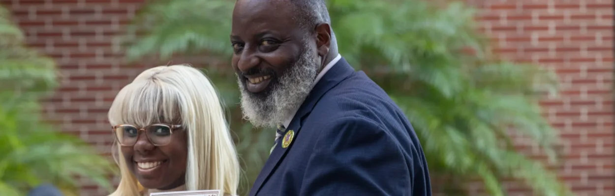 Dyz'Jhae Davis and Westside High principal Vincent Foster