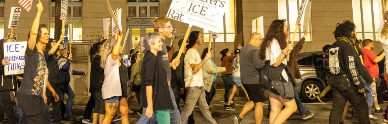 Protesters march during an anti-ICE rally in Downtown Jacksonville.