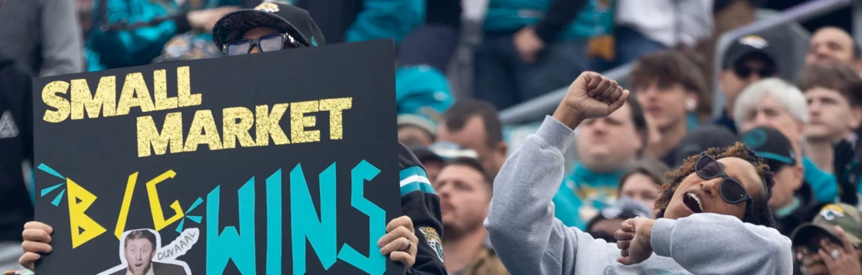 Fans in the stands root for the Jacksonville Jaguars.