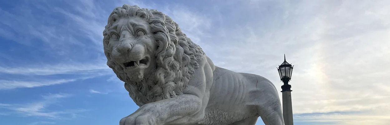 One of the twin marble lions that guard St. Augustine's Bridge of Lions.