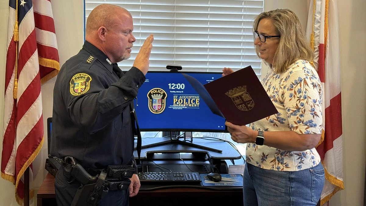 St. Augustine's new police chief, Jon Marston, sworn in by his predecessor, Jennifer Michaux