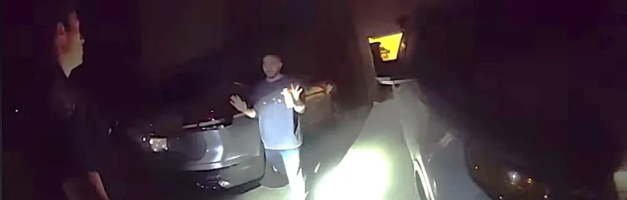 Police confront a man before a shooting.