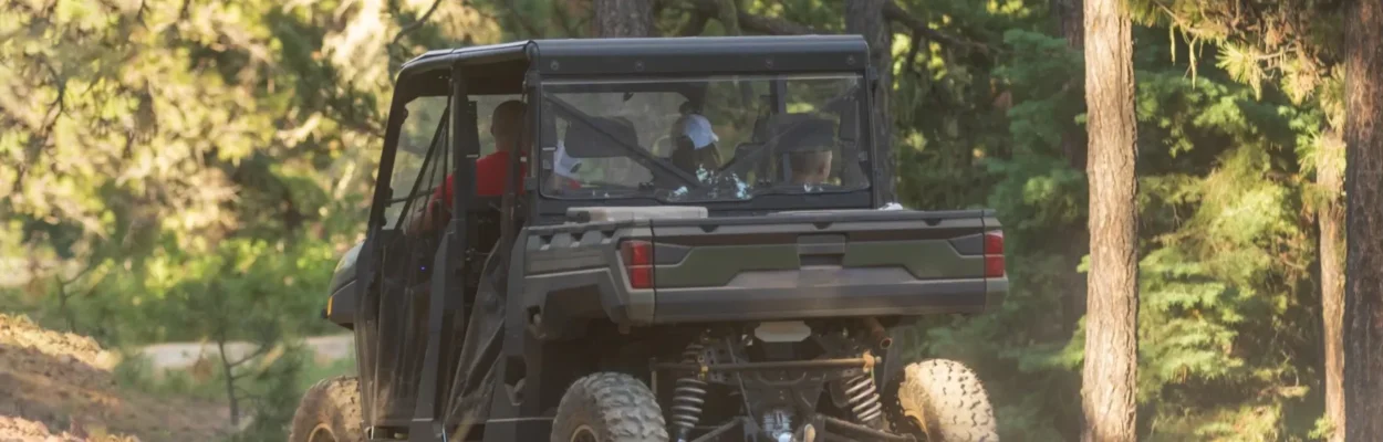 A UTV on a trail.