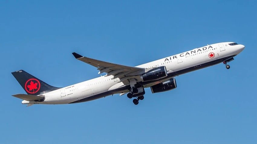 An Air Canada plane in flight, the same type of plane that will fly between Jacksonville and Toronto.