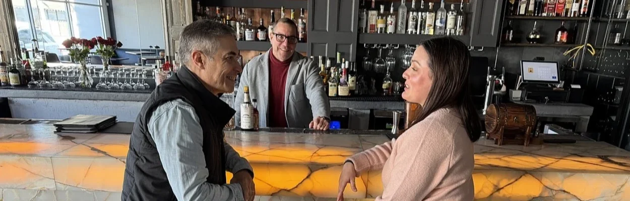 The owners of Cafe San Marco and Bar San Marco sit at the bar.