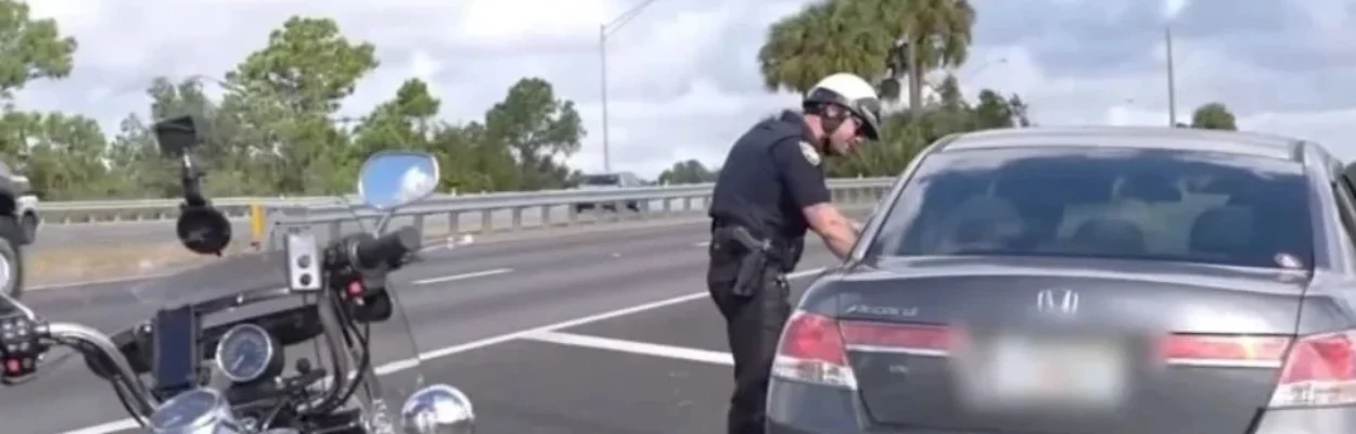 Officer Christian Madsen making a traffic stop.