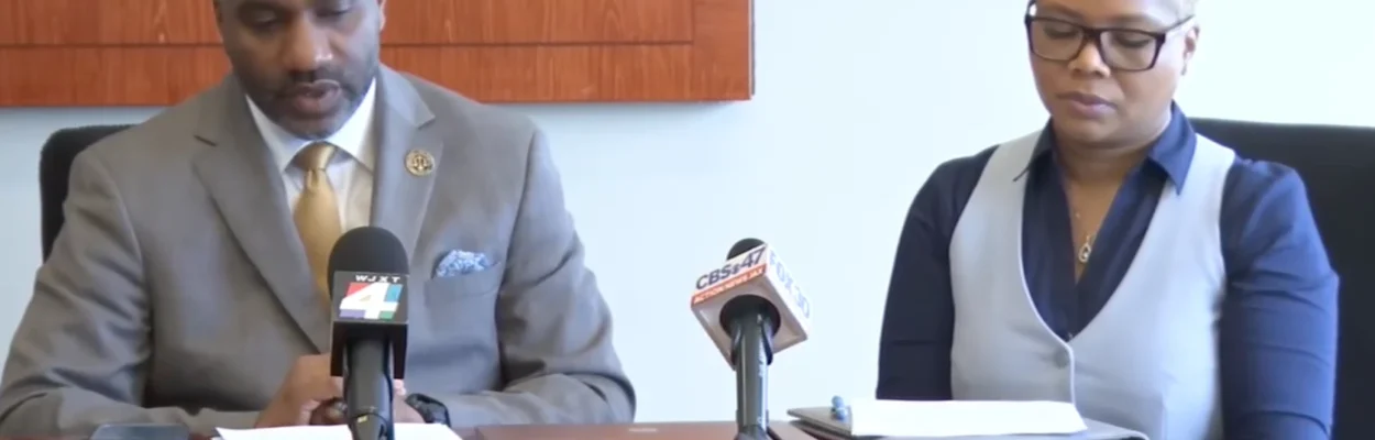 Jacksonville Attorney Lamonte Carter and iCity Christian School Executive Director Terrie Hairston announce a group of private schools' lawsuit against Step Up For Students.