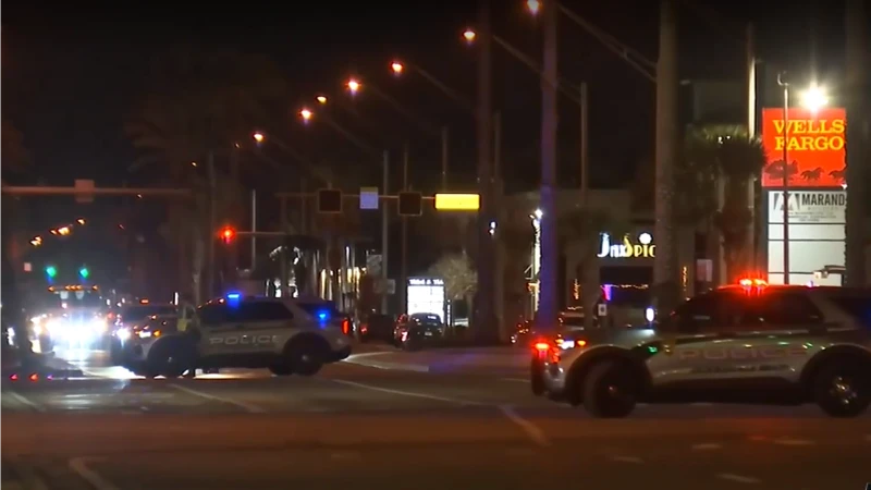 Jacksonville Beach police block traffic to investigate a shooting.