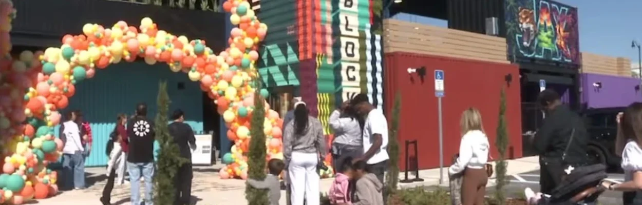 Crowds at the entrance of Block Jax, which is decoated with balloons.