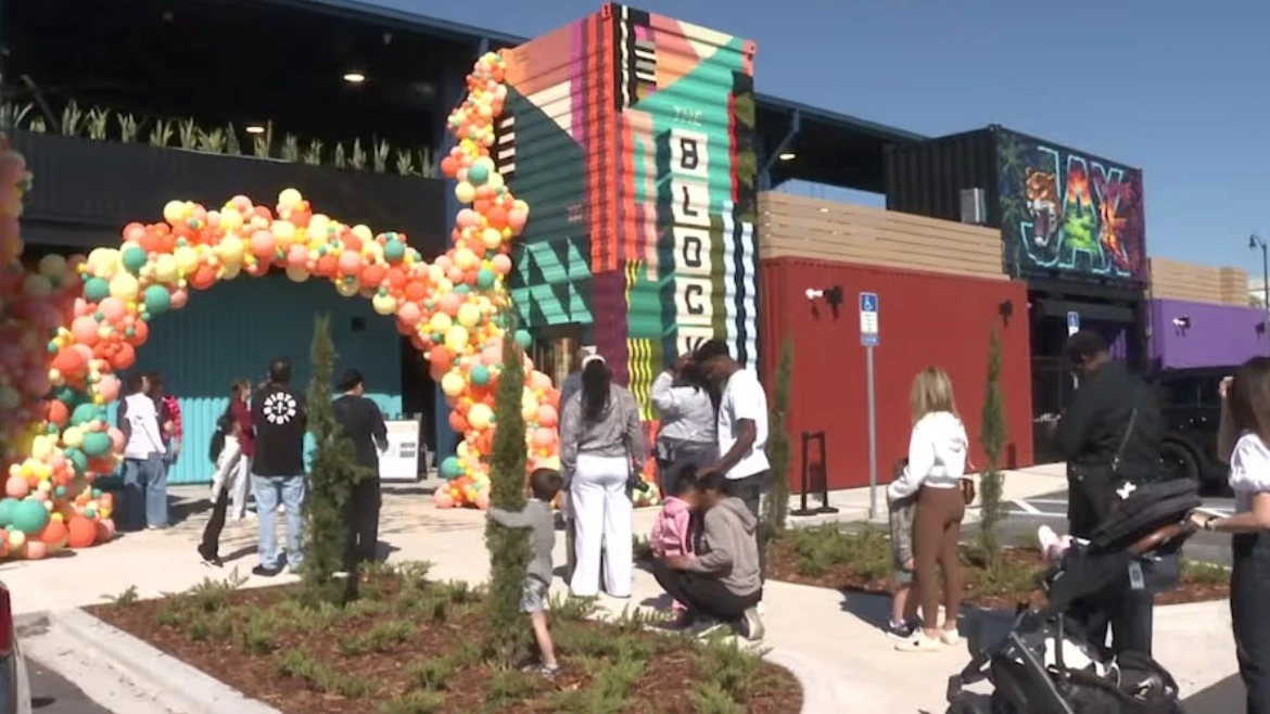 Crowds at the entrance of Block Jax, which is decoated with balloons.