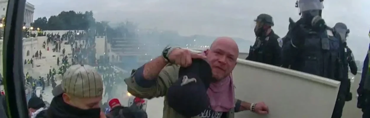 Rioter Andrew Paul Johnson on the terrace of the U.S. Capitol on Jan. 6, 2021.