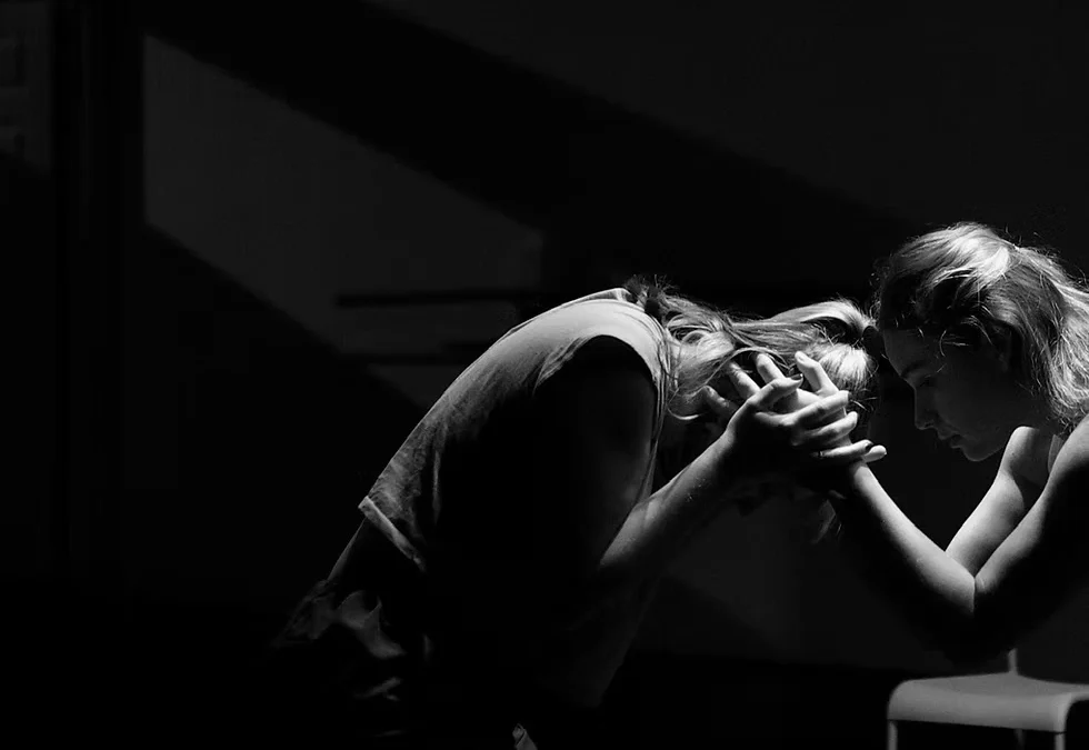 two women dance as part of Women Arts Exchange, one pick for What to Do