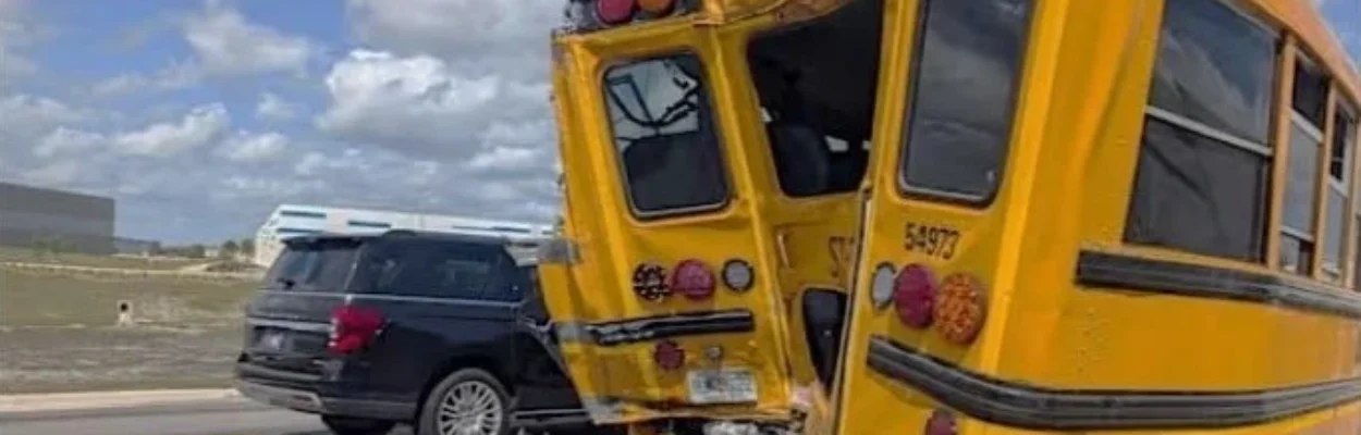 The crumpled rear end of a school bus.
