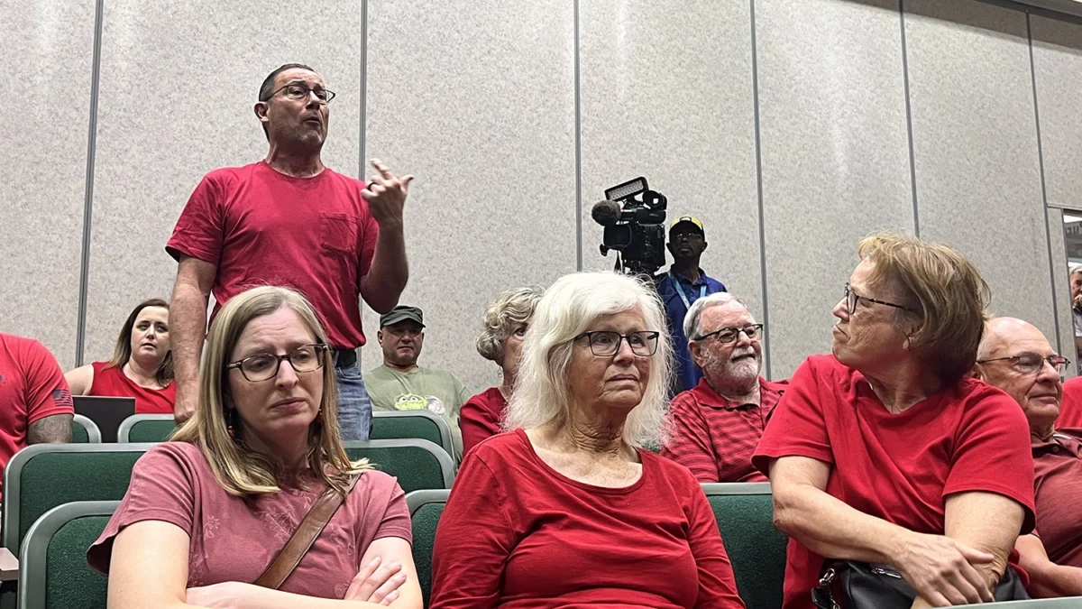 Speakers oppose a proposed Daily's gas station, convenience store and car wash in Fruit Cove.