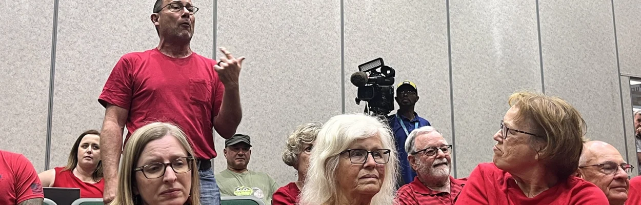 Speakers oppose a proposed Daily's gas station, convenience store and car wash in Fruit Cove.