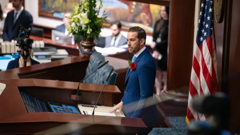 Florida House Speaker Perez stands at his lectern