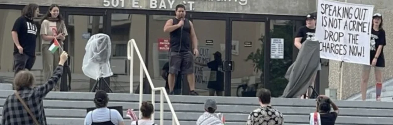 Supporters rally May 28, 2025, after three protesters were arrested at a City Council meeting.