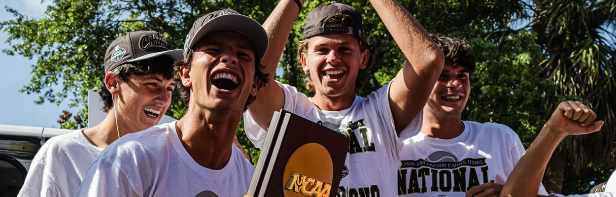 Flagler College's men's tennis team celebrates its national championship victory