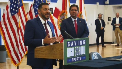 Featured image for “DeSantis comes to Ribault High to sign bills supporting high school coaches”