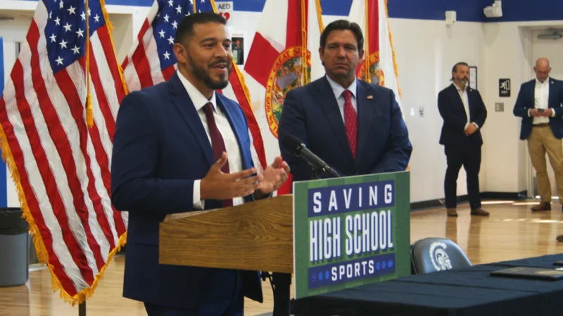 Featured image for “DeSantis comes to Ribault High to sign bills supporting high school coaches”