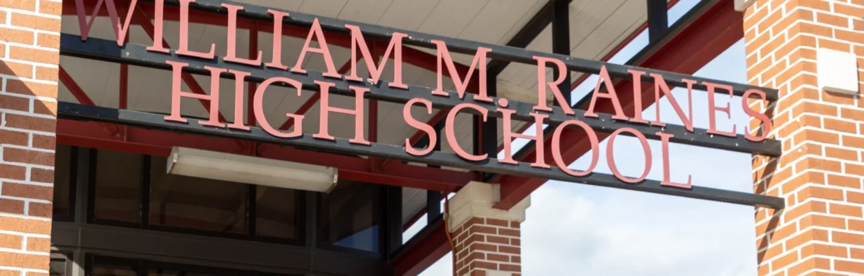 Sign over the door at William M. Raines High School