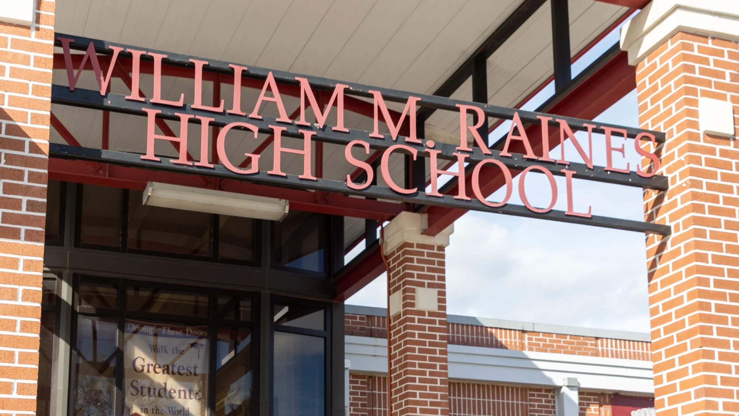 Sign over the door at William M. Raines High School