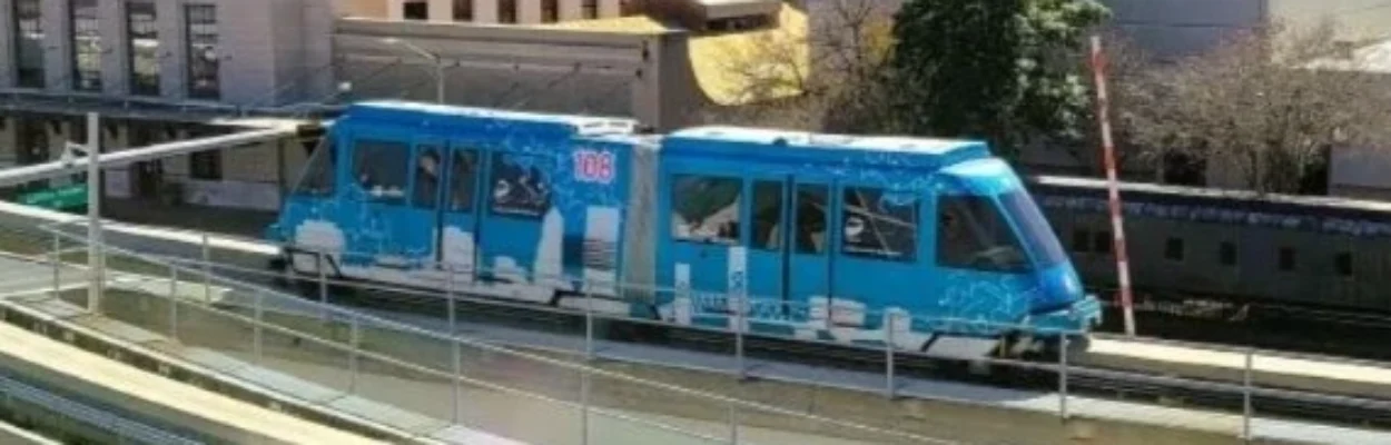 Skyway cars pulling into a station