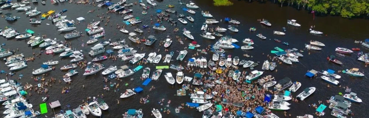 Dozens of boats are shown from overhead on Boater Skip Day in 2025.