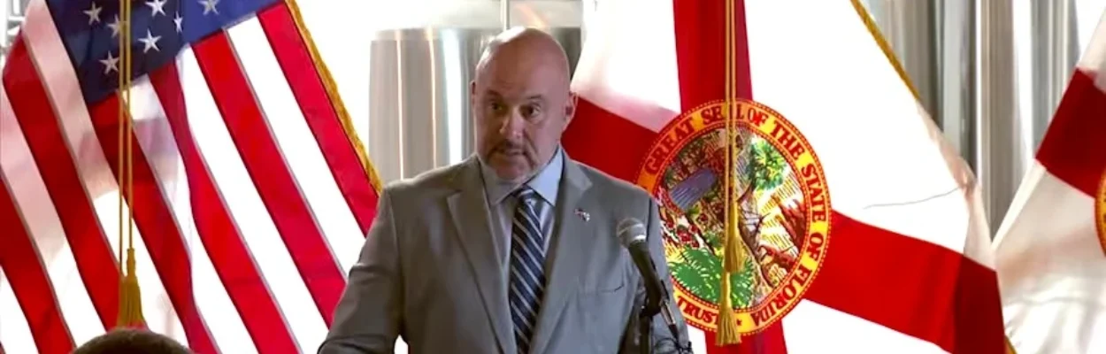 Florida CFO Blaise Ingoglia speaks at a lectern in Jacksonville Beach.
