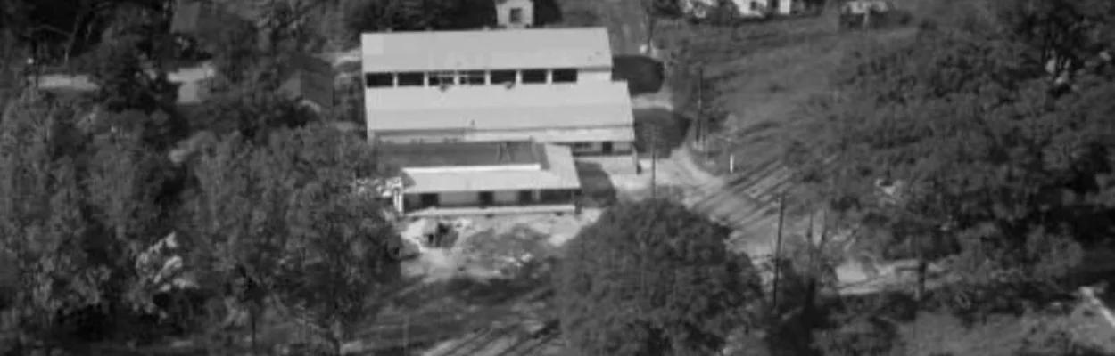 A historic photo shows an aerial view of Draper's Egg & Poultry plant
