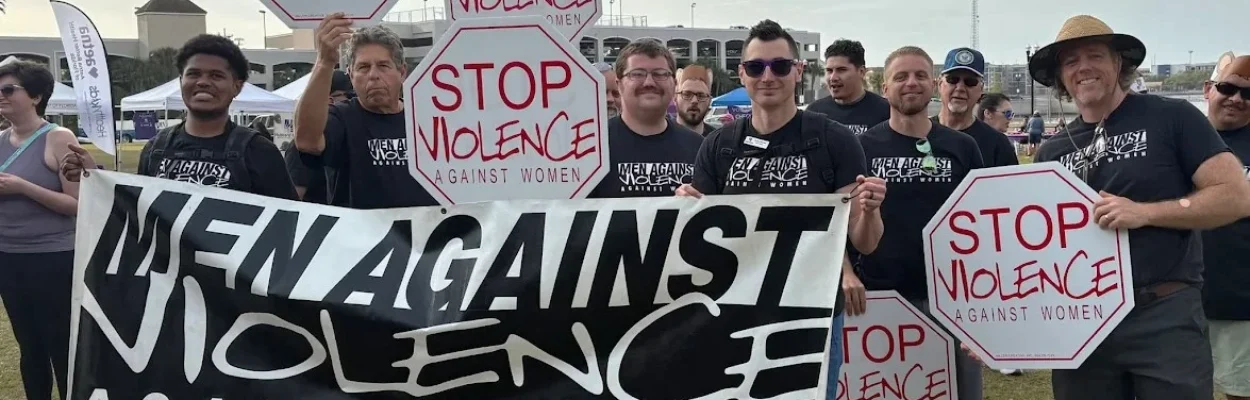Men march to prevent domestic violence in a photo from Hubbard House