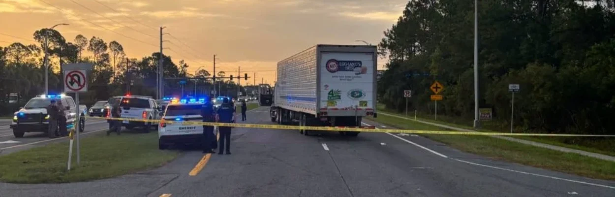 Police on the highway investigate the death of a man who was running from ICE agents.