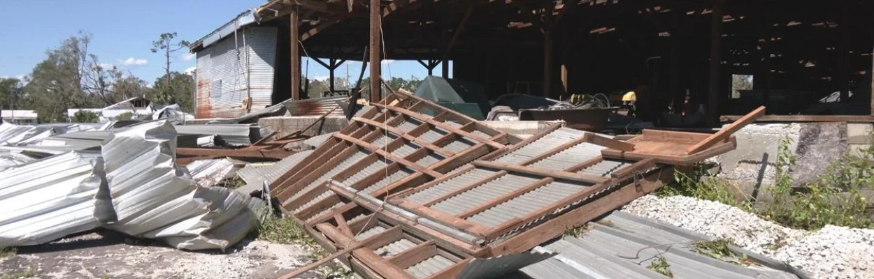 A wall toppled by Hurricane Helene in 2024.