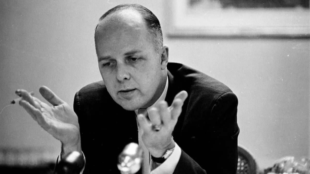 Joseph Mitchell gesturing while discussing work requirements for welfar.