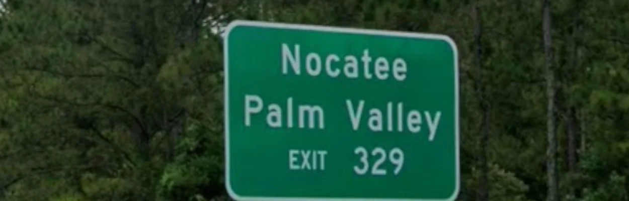 A highway sign for Nocatee, near land proposed for a large-scale residential development.