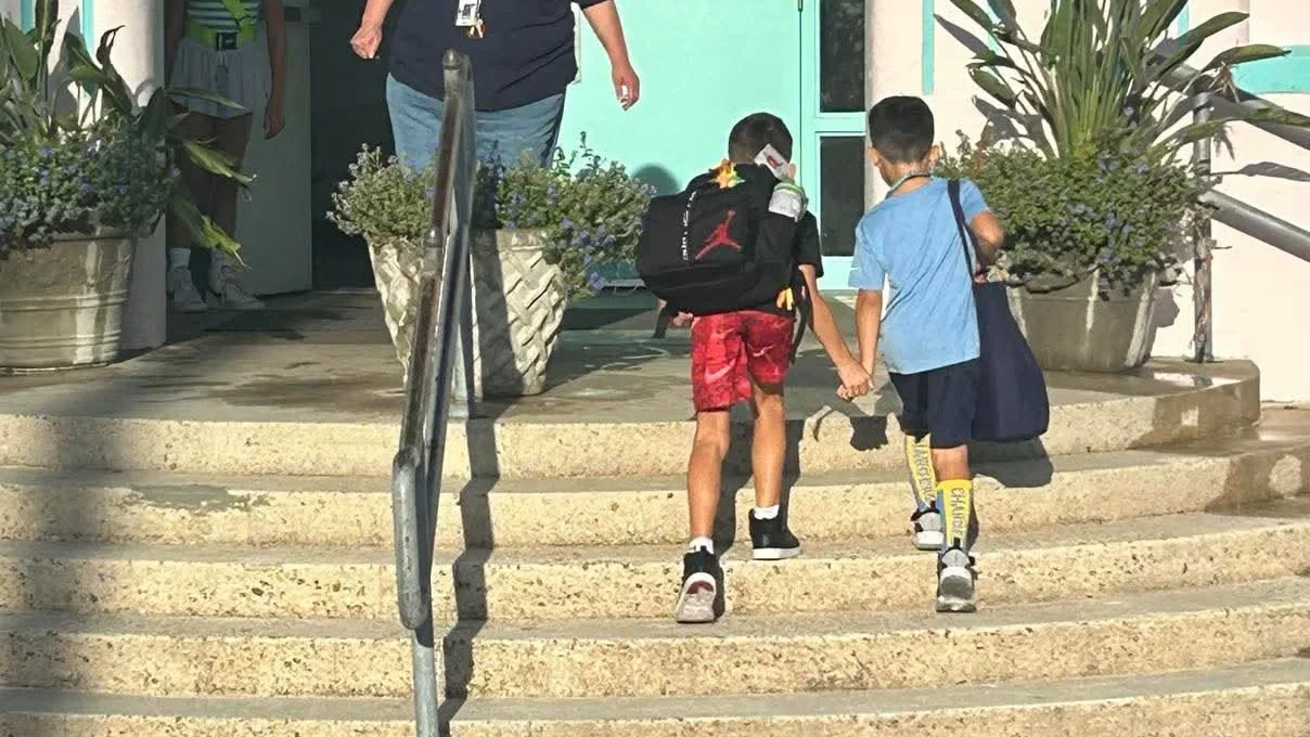 Students walk up the steps at Atlantic Beach Elementary School