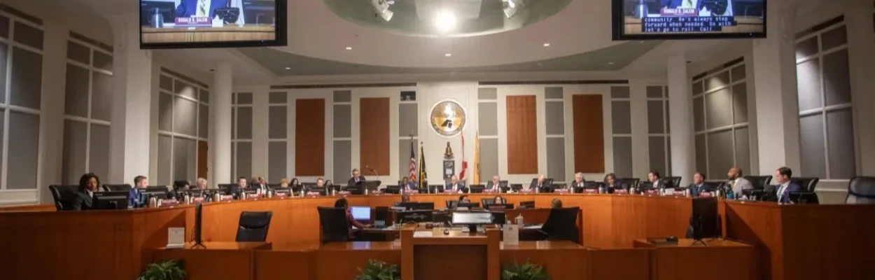 Jacksonville City Council chambers is shown with City Council members sitting on the dais.