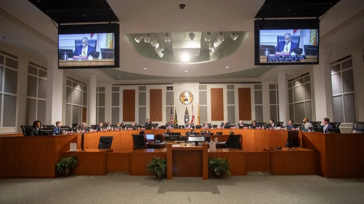 Jacksonville City Council chambers is shown with City Council members sitting on the dais.