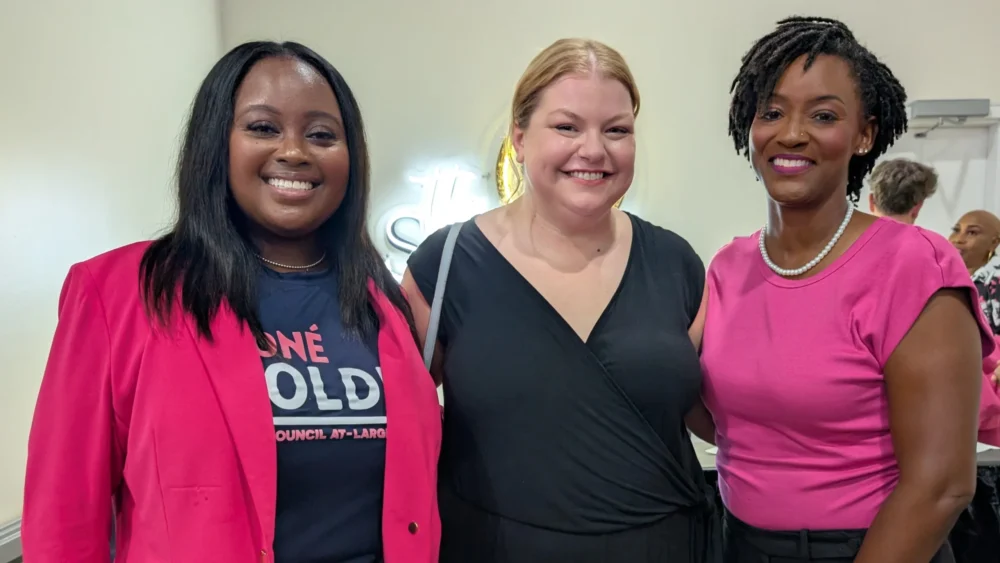 Moné Holder with other Democrats at an Election Day watch party
