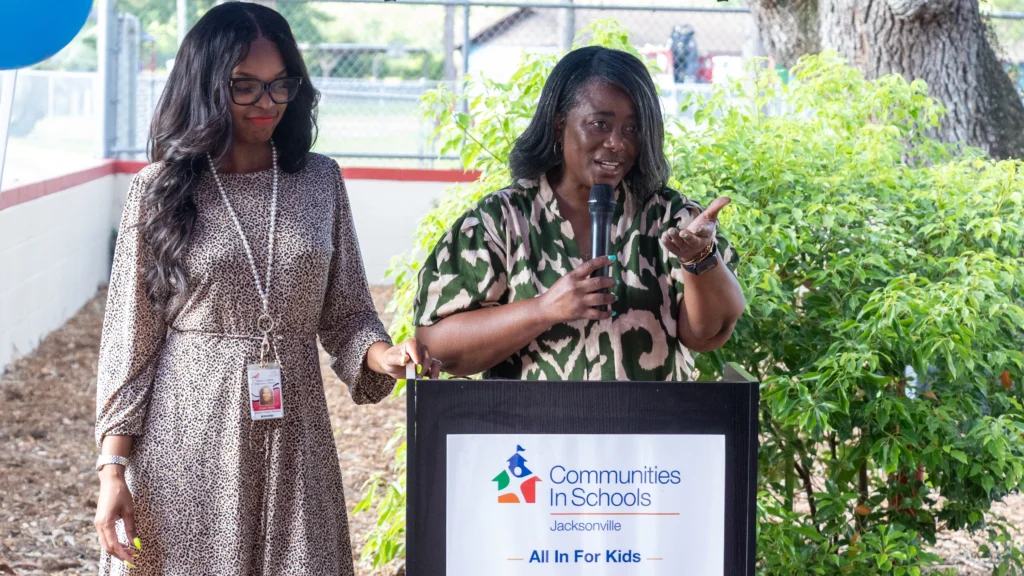Sallye B. Mathis Elementary Principal Latarsha Jones, right, and Assistant Principal Angel Holsey-Collins, left, speak during a July 8, 2026 press event.