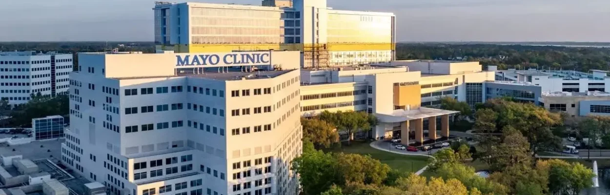 large while hospital building aerial with MAYO CLINIC written atop on of the structures in big lettering