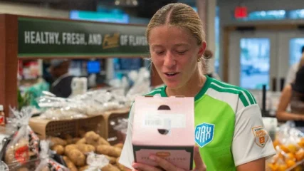 Featured image for “BIT OF JOY | Sporting Jax Women’s club donates to local grocery store”