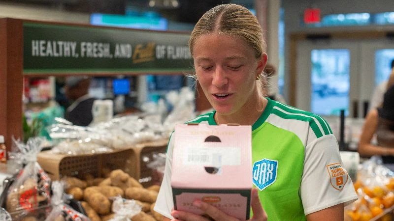Featured image for “BIT OF JOY | Sporting Jax Women’s club donates to local grocery store”